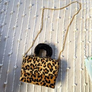 Small cheetah fuzzy strap purse